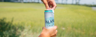 Island Active Beer Being Opened
